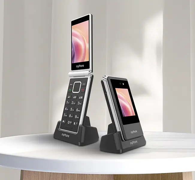 telefon myPhone tango 2 LTE, pokazany w bazie ładującej z otwartą i zamkniętą klapką
